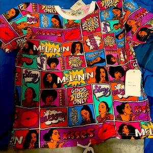 Melanin magic shirt it’s a Larger never worn it